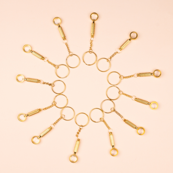 https://suryaarthandicrafts.com/wp-content/uploads/2024/10/Brass-Magnifying-Keychain-4-600x600.png