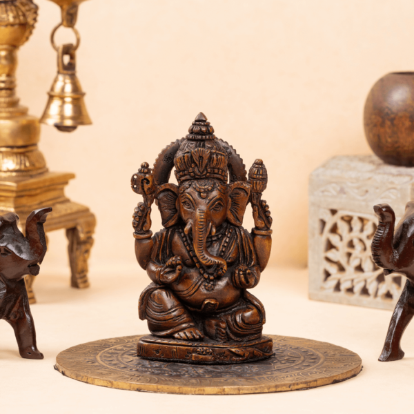 https://suryaarthandicrafts.com/wp-content/uploads/2024/10/WOODEN-FAIN-TOOK-SITTING-GANESH1-600x600.png