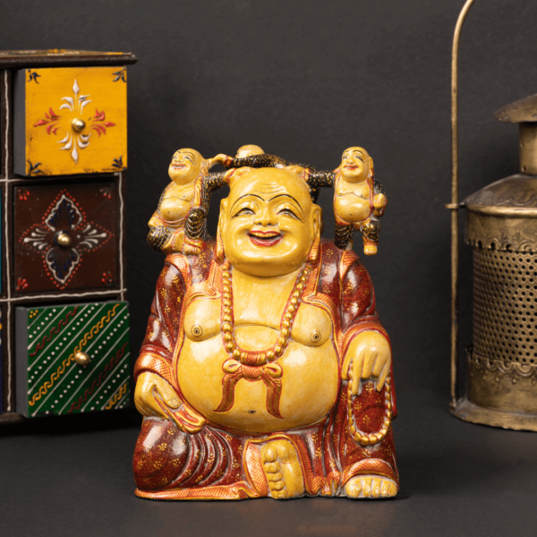 https://suryaarthandicrafts.com/wp-content/uploads/2024/10/WOODEN-PAINTED-LAUGHING-BUDHA1-600x600.png