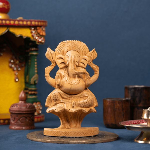 https://suryaarthandicrafts.com/wp-content/uploads/2024/10/WOODEN-TOOK-SNAKE-GANESH4-600x600.png