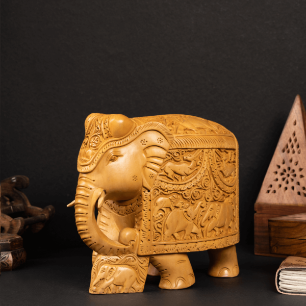 https://suryaarthandicrafts.com/wp-content/uploads/2024/12/WOODEN-CARVING-ELEPHANT-600x600.png