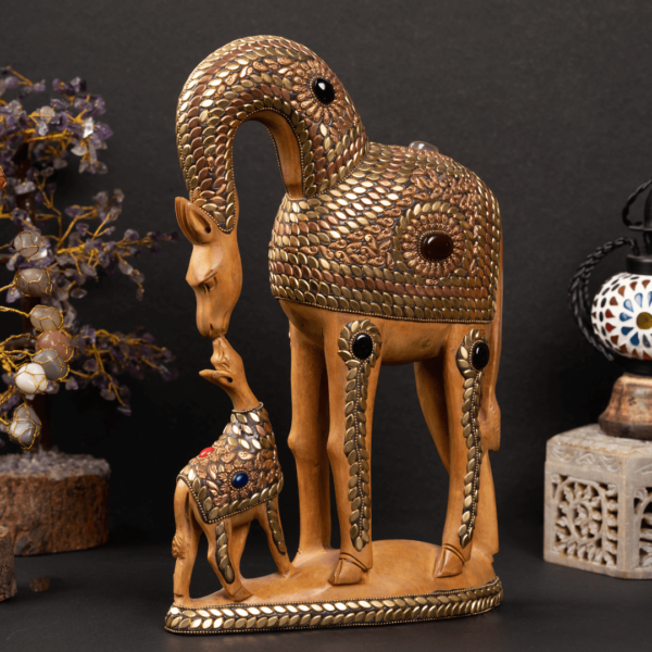 https://suryaarthandicrafts.com/wp-content/uploads/2024/12/WOODEN-FAIN-BRASS-JADAI-WORK-GIRAFFE-WITH-BABY-600x600.png