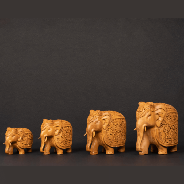 https://suryaarthandicrafts.com/wp-content/uploads/2024/12/WOODEN-FAIN-CARVING-ELEPHANT-SET-OF-4-TRUNK-D-600x600.png