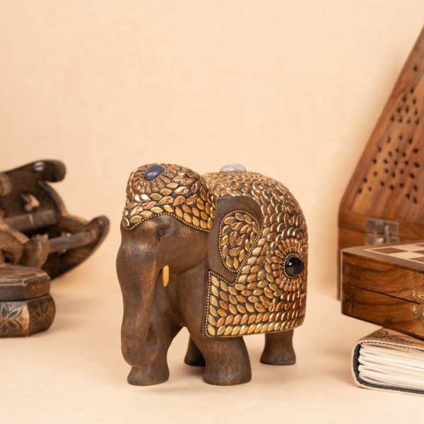 https://suryaarthandicrafts.com/wp-content/uploads/2024/12/WOODEN-FAIN-ELEPHANT-WITH-BRASS-JADAI-WORK-600x600.png