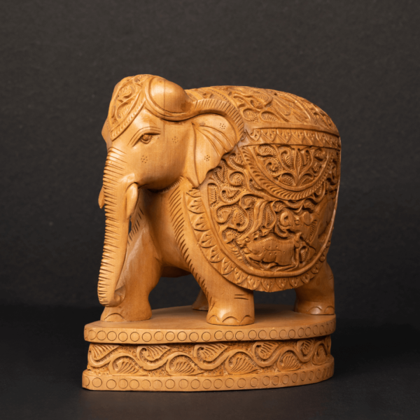 https://suryaarthandicrafts.com/wp-content/uploads/2024/12/WOODEN-FAIN-SHIKAR-CARVING-ELEPHANT-4-600x600.png