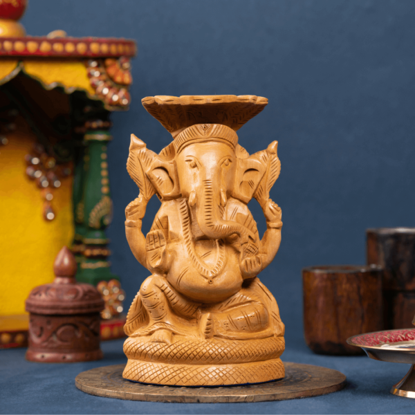 https://suryaarthandicrafts.com/wp-content/uploads/2024/12/WOODEN-SNAKE-GANESH-600x600.png