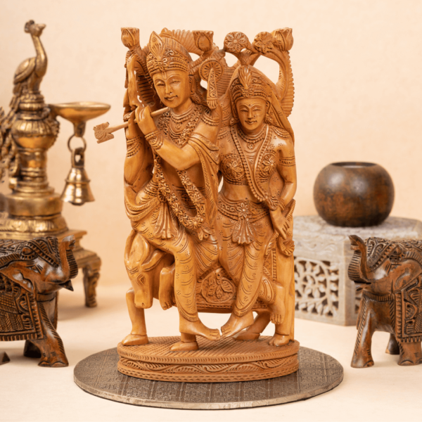 https://suryaarthandicrafts.com/wp-content/uploads/2025/01/WOOD-FAIN-CARVING-LORD-RADHA-KRISHNA-1-1-600x600.png