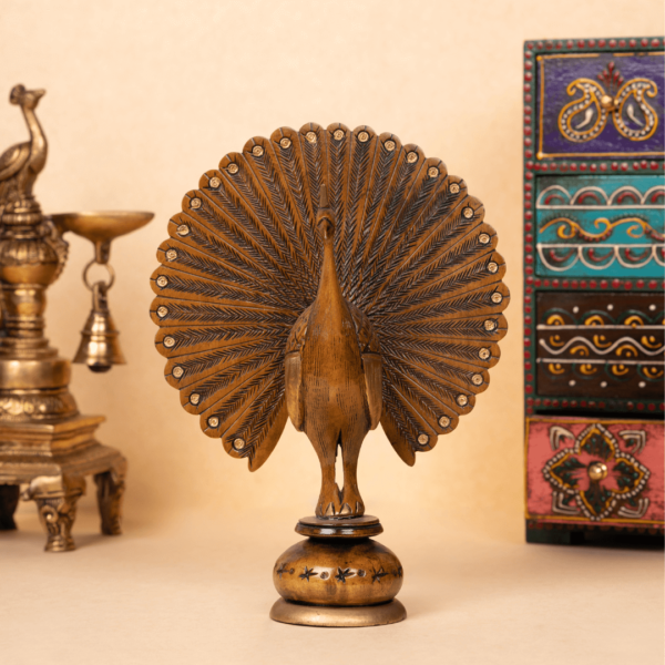 https://suryaarthandicrafts.com/wp-content/uploads/2025/01/WOODEN-CARVING-ANTIQUE-PEACOCK-1-600x600.png